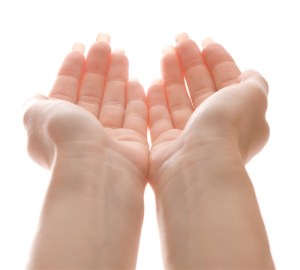 Female hands holding something, isolated on white background