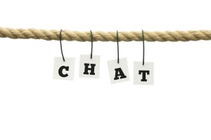 Alphabet letters - c-h-a-t - hanging by wires