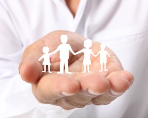 ideas,paper family in  hand