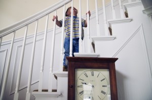 Young boy climbing stairs