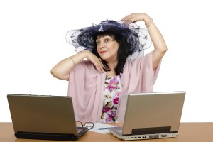 Marriage broker enjoy working online with her personal clients. Agent sitting on white background